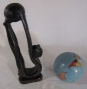 Wooden tribal figure H 31 cm & a painted metal globe of the world