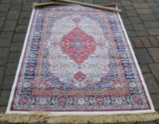 Ivory ground cashmere rug with floral medallion pattern approx 172cm by 116cm