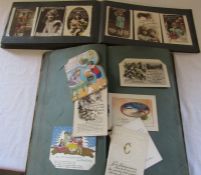 2 vintage postcard albums containing mainly early 20th century greeting cards