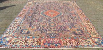Iranian blue ground carpet, medallion design, surrounding border with animals, Kashmir region, 390cm
