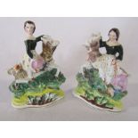 Pair of Staffordshire flatback figures of children / young girls riding goats possibly with some