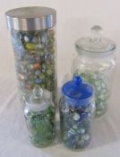 4 jars of coloured marbles - tallest 28 cm