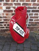 Spalding 'Top-flite' red golf bag (appears unused)