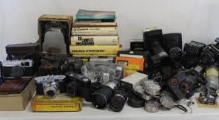 Selection of cameras, tripods, books on photography, Johnson Exactum postcard printer, Brownies,