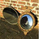 Regency style gilt framed convex mirror with eagle mount H 71 cm and a bevel edge oval mirror L 77.5