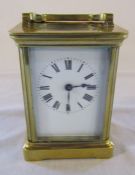 Brass carriage clock (height excluding handle 11 cm ) (damage to back pane of glass)