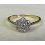 9ct gold (minimum - hallmarked indistinguishable) and platinum diamond daisy ring size O/P weight