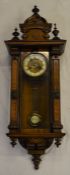 Vienna regulator wall clock with a 2 train spring driven mechanism with stained wood decorated