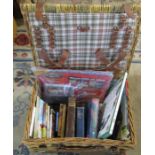 Wicker picnic hamper containing various books inc Harry Potter, The Home Workshop, Bleak House and