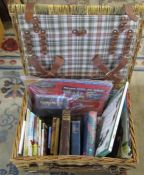 Wicker picnic hamper containing various books inc Harry Potter, The Home Workshop, Bleak House and