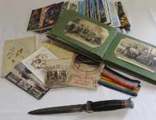 Small album containing German civilian money, Giessen 1916 postcard, selection of Prisoner of War