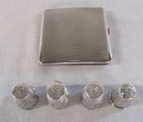 4 silver thimbles (marked 925) weight 0.60 ozt and a silver compact case Birmingham 1940 total