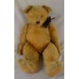 Large vintage mohair teddy bear with some repairs Ht approx 75cm