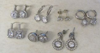 7 pairs of silver earrings (for pierced ears)