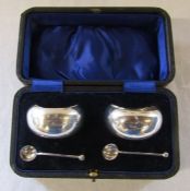 Cased pair of silver salts Chester 1915 (spoons 1913), maker Barker Brothers, weight 5.48 ozt