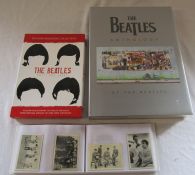 Album containing 59 The Beatles A & B C chewing gum cards with facsimile autographs, sealed The