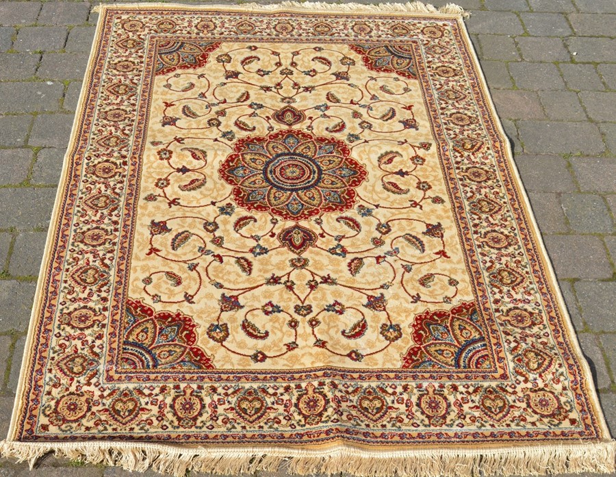 Kashmir full pile rug on gold ground with floral medallion design 170cm x 120cm