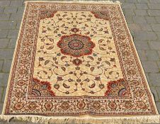 Kashmir full pile rug on gold ground with floral medallion design 170cm x 120cm