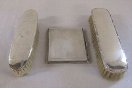 Silver cigarette case Birmingham 1936 weight 4.61 ozt and 2 silver topped brushes Birmingham 1918
