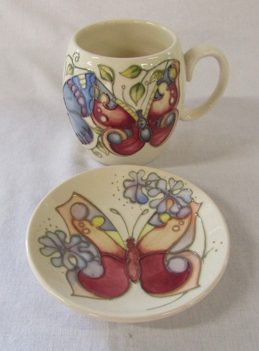 Moorcroft 'butterfly' pattern mug H 8.5 cm and pin dish D 12 cm