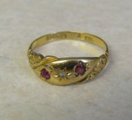 18ct gold ruby and diamond gypsy ring size N weight 2.1 g