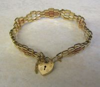 9ct three colour gold gate bracelet and padlock, weight 6.5 g