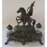 A French early 20th century spelter ink stand / desk stand of a hunting man on horseback signed A