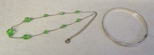 Sterling silver adjustable bangle 8.2 g & a silver and green bead necklace 3.4 g