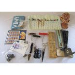 Various items in sea shells, lace bobbins, corkscrews, fans, stamps etc