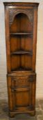 Titchmarsh & Goodwin small oak corner cupboard with carved decoration (2020 Retail Price List £1310)