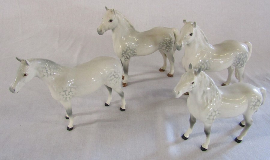 4 Beswick dapple grey horses / ponies inc 2 welsh mountain (tallest H 16 cm) (one with small chip to