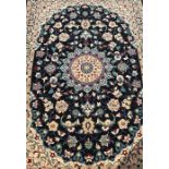 Fine woven full pile rug with black field & floral medallion 150cm x 100cm