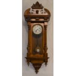 Vienna regulator wall clock with a 2 train spring driven mechanism with fluted columns & mask head