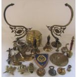 Various brassware inc sconces (gas and piano), door knockers, bells and a biscuit barrel etc