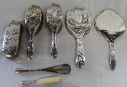 Decorative silver dressing table set with embossed swallows, maker James Dixon & Sons, Sheffield