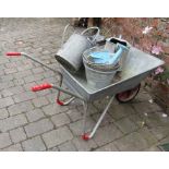 Wheelbarrow, watering cans, buckets etc