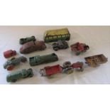 11 playworn Dinky cars and tin plate toys