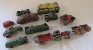 11 playworn Dinky cars and tin plate toys