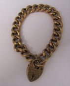 9ct gold bracelet with heart shaped lock, weight 18.7 g