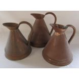 3 large copper jugs (height to top of handle 27 cm, 24 cm and 23 cm)