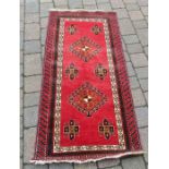 Turkish handmade red ground rug 151 cm x 73 cm