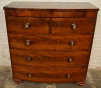 Victorian mahogany veneer bow fronted chest of drawers on turned legs Ht 117cm W 109cm D 51cm