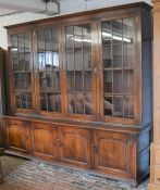 Large oak reproduction Georgian oak display bookcase (in 2 sections) L 240cm Ht 218cm D 54cm