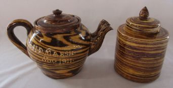 Edwardian slipware double spout teapot 'Mrs H D Marsh, November 1911' and a similar lidded jar