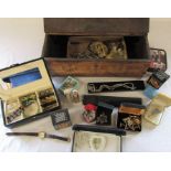 Carved wooden box containing assorted costume jewellery inc some silver rings and a silver thimble