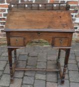 Georgian & possibly later oak clerk's desk on turned legs Ht 101cm W 74cm D 49cm