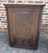 Heavily carved oak corner cupboard H 105 cm L 78 cm