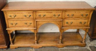 Extremely good quality reproduction Georgian oak dresser base with cross banding, canted corners &