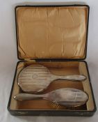 Cased silver dressing table set consisting of hairbrush and mirror Birmingham 1926 (missing comb)