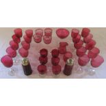 Selection of cranberry glass inc wine glasses and sugar shakers